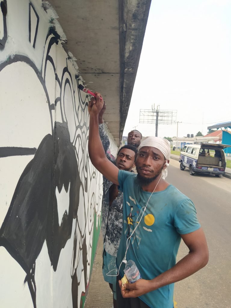 Graffiti Kings installing Murals on Ikwerre Road Flyover, Port Harcourt, Rivers State