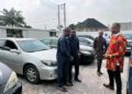 Edison Ehie Presents Cars to Aides