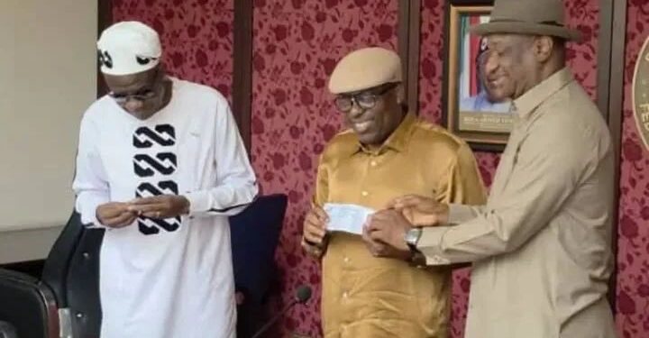 BREAKING: Fubara Receives APC Membership Card From Tony Okocha