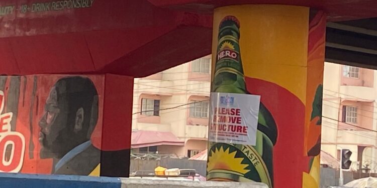 RISAA Plasters “Remove Structure” Notice on Controversial Flyover Beer Ad